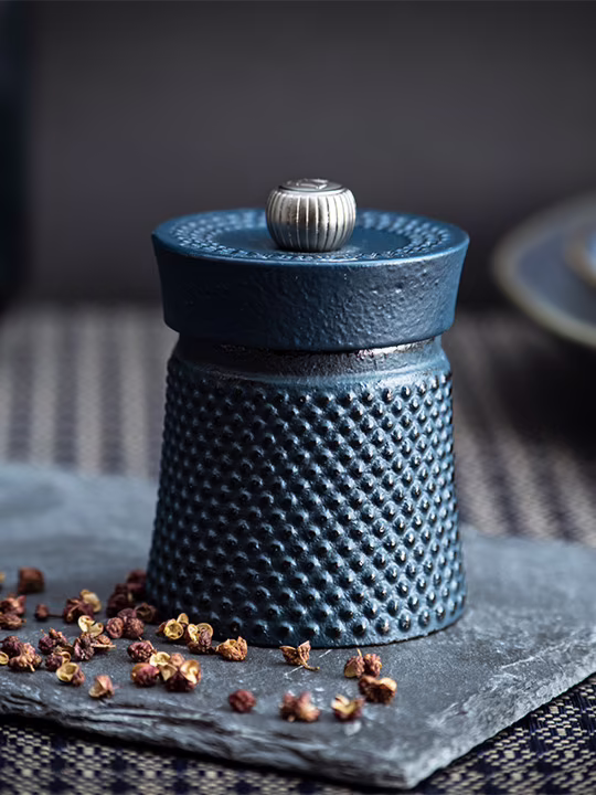 Blue salt shop and pepper grinders