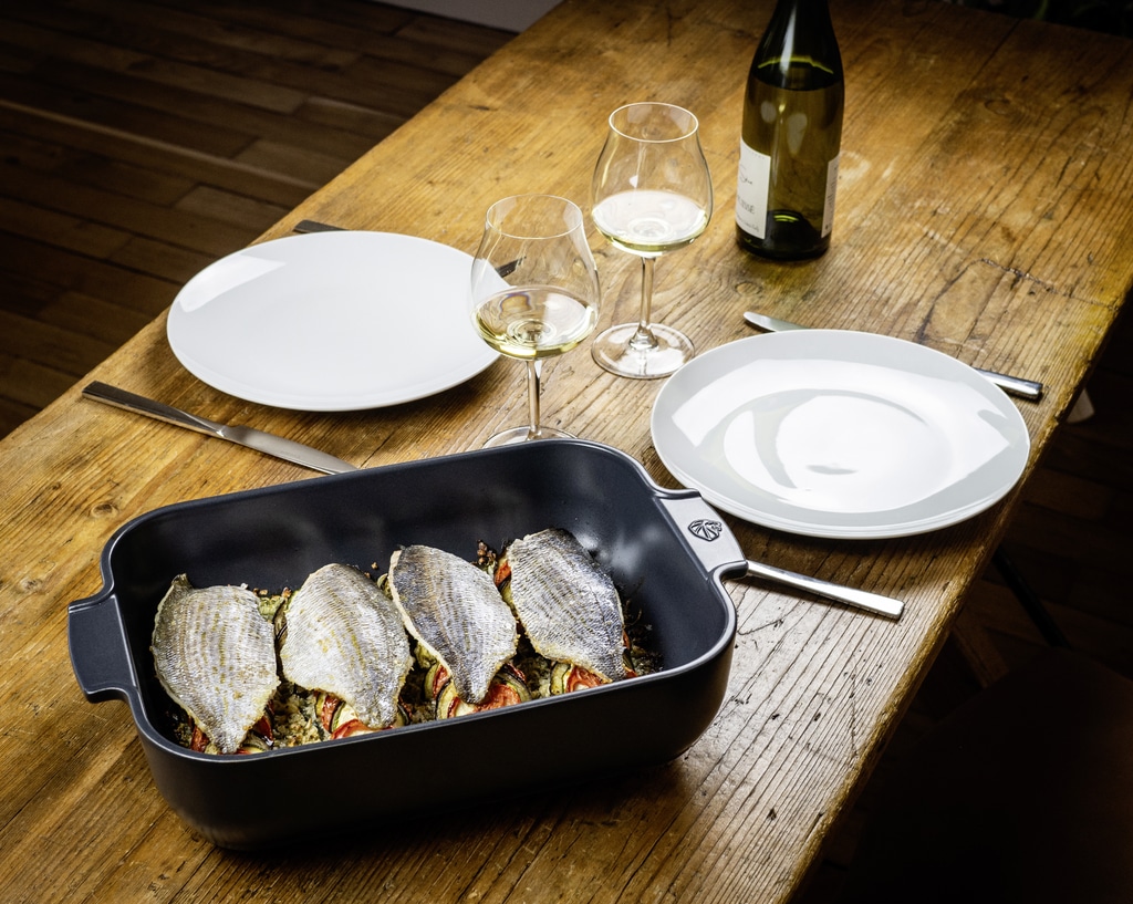 Baked sea bream fillets on summer vegetables