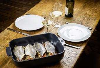 Baked sea bream fillets on summer vegetables