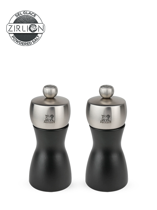 Image of The combination of wood and stainless steel enhances the majestic curves of the salt and pepper mills that form the Fidji black duo. A duo that will c